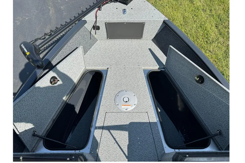 Slide: The Image of 2026 Lund 1775 Adventure Sport boat on trailer, parked outdoors. - 4