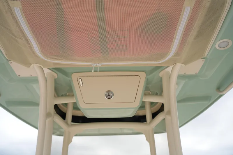 Slide: The Image of 2025 Grady-White 251 Coastal Explorer boat, underside view with storage compartment. - 26