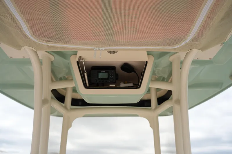 Slide: The Image of 2025 Grady-White 251 Coastal Explorer boat console with electronic equipment. - 33