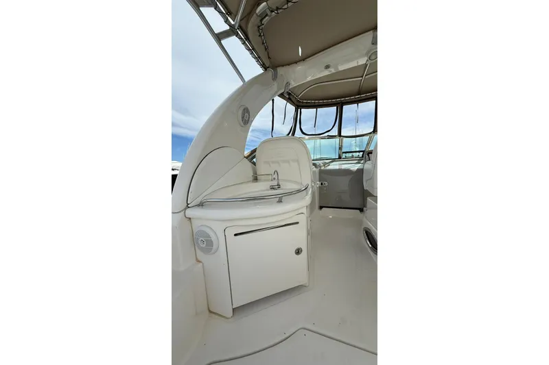 Slide: The Image of 2006 Sea Ray 340 Sundancer interior with sink and cabinetry under canopy. - 4