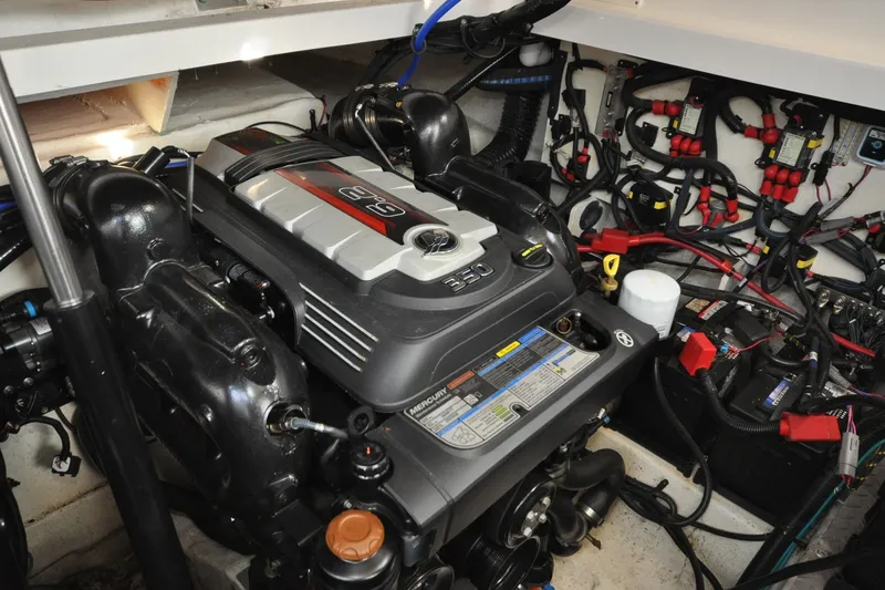 Slide: The Image of Engine room of 2020 Sea Ray Sundancer 320 with detailed wiring and components. - 20