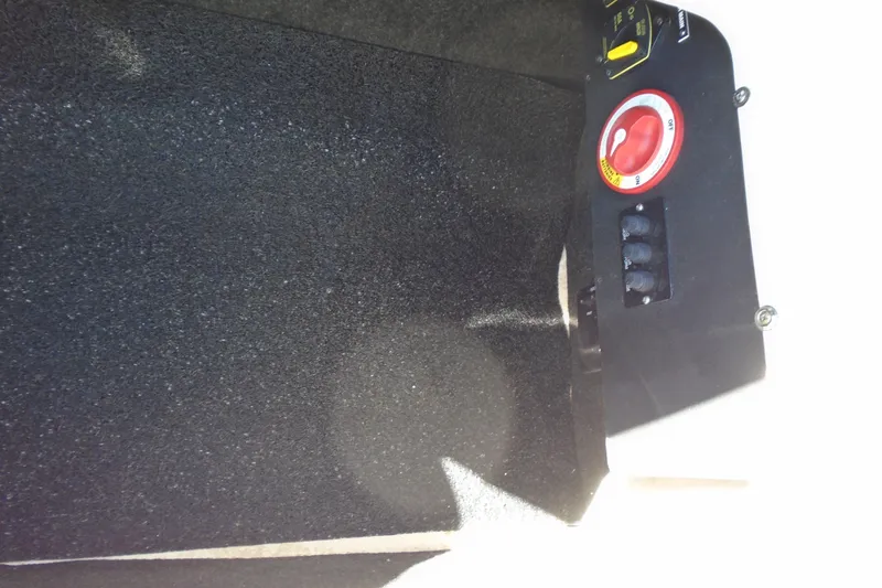 Slide: The Image of Control panel of 2020 Regal LX4 with red switch and textured surface. - 13