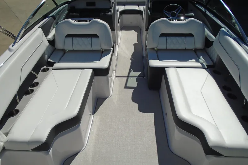 Slide: The Image of 2020 Regal LX4 boat interior with spacious seating and modern design. - 22