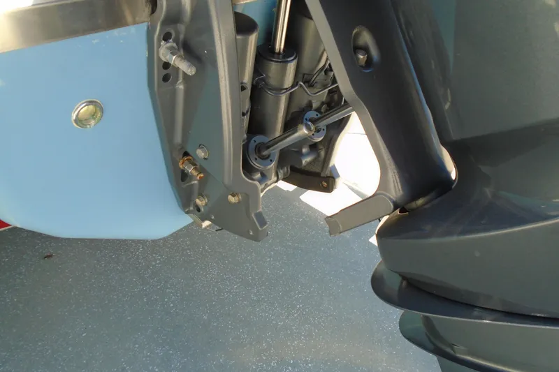 Slide: The Image of Close-up of a 2020 Regal LX4 boat engine mount and hydraulic system. - 24