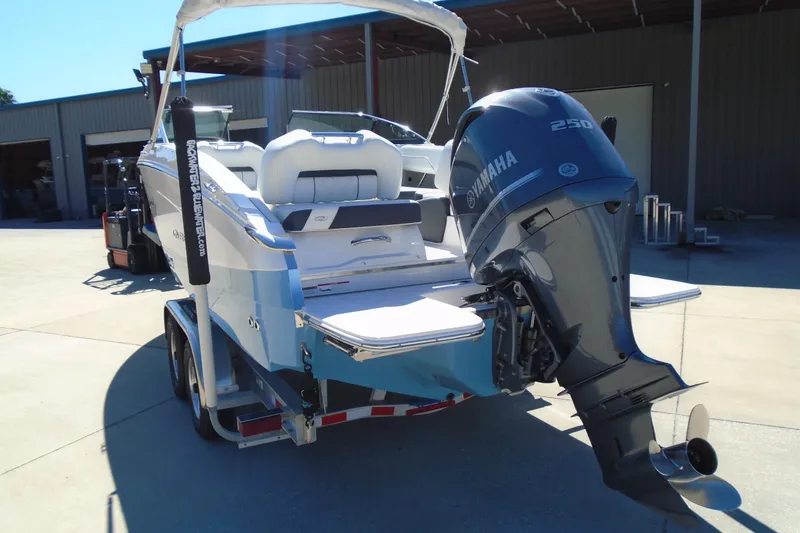 Slide: The Image of 2020 Regal LX4 boat with Yamaha 250 outboard motor on trailer. - 5