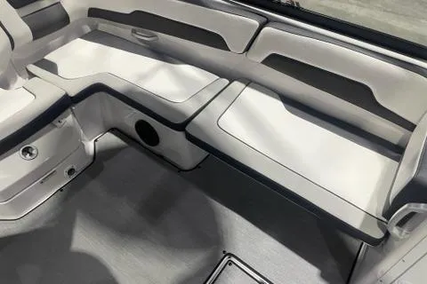 Slide: The Image of 2025 Yamaha Boats AR195 interior seating with sleek, modern design and comfortable upholstery. - 6