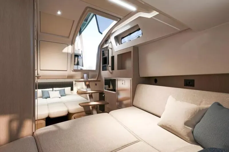 Slide: The Image of 2026 Beneteau Gran Turismo 35 yacht with luxurious deck seating and colorful cushions. - 10