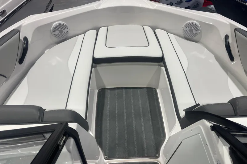 Slide: The Image of 2025 Yamaha Boats AR190 interior with cushioned seating and speakers. - 6