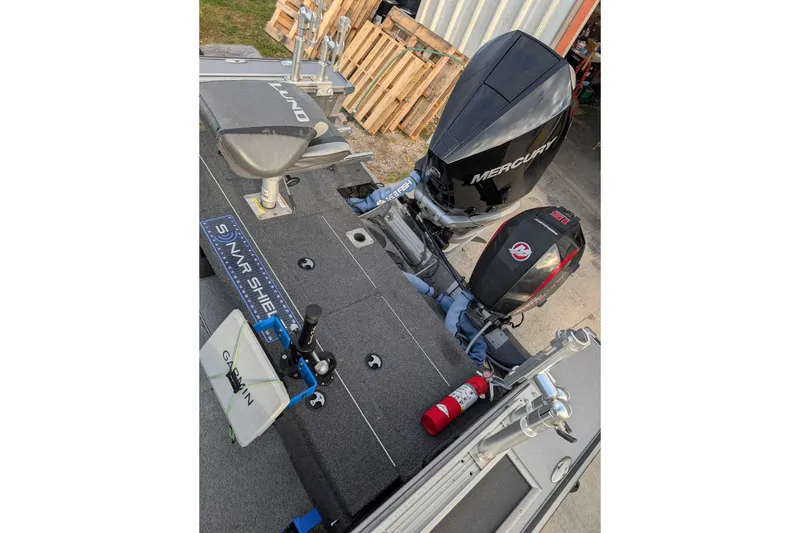 Slide: The Image of 2019 Lund 2075 Pro-V boat with Mercury outboard motor and Garmin equipment. - 8