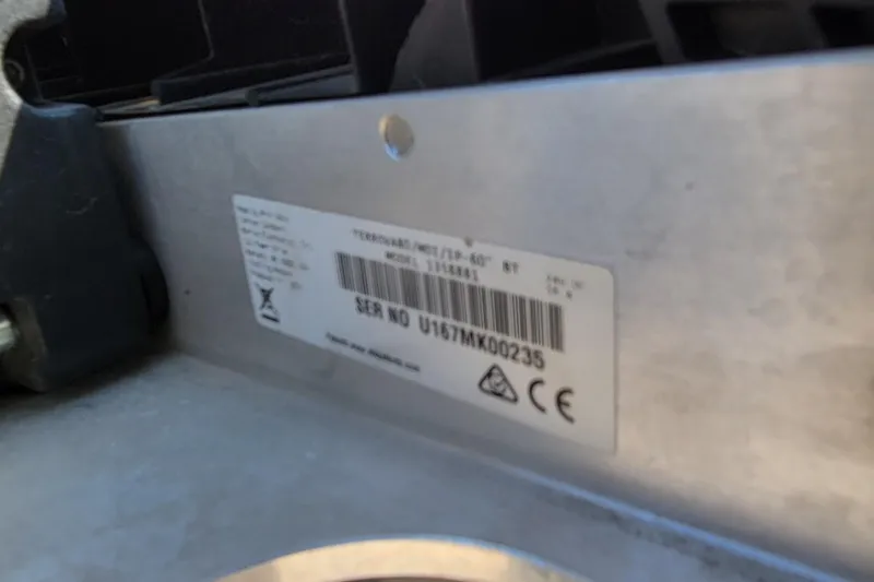 Slide: The Image of Label on a 2016 Tracker device with serial number and certification symbols. - 21