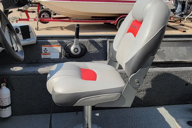 Slide: The Image of Boat interior with Tracker seat, steering wheel, and control lever, 2016 model. - 24