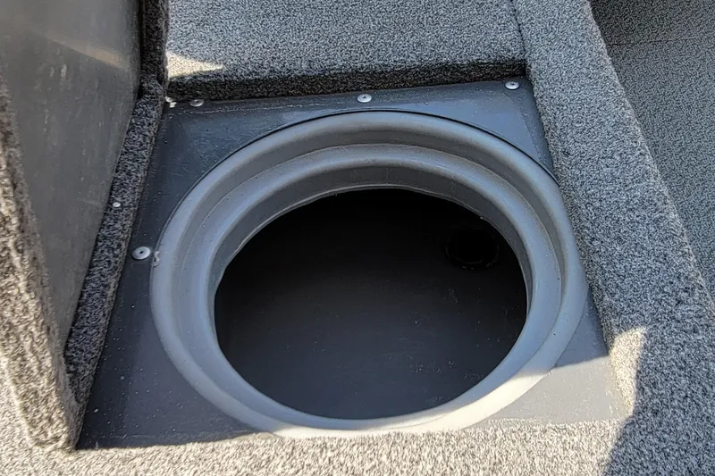 Slide: The Image of 2016 TRACKER MARINE PRO GUIDE V-16 SC boat compartment with circular opening. - 4