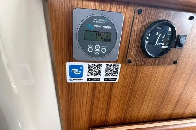 Slide: The Image of Control panel of 2025 Ranger Tugs R-25 Luxury Edition with Victron Energy display. - 23