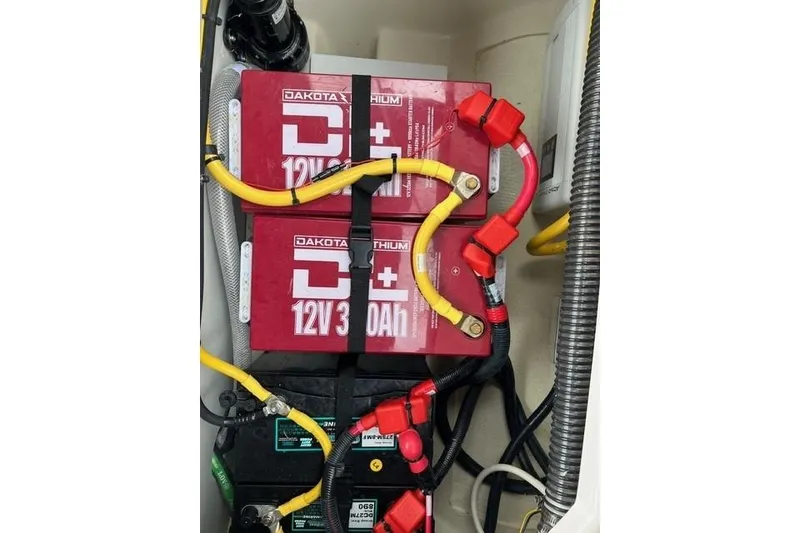 Slide: The Image of Batteries in 2025 Ranger Tugs R-25 Luxury Edition, featuring Dakota Lithium 12V 30Ah units. - 8