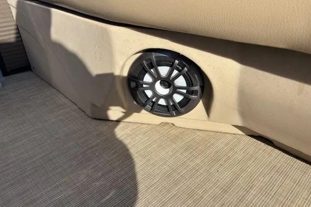 Slide: The Image of Speaker on 2020 Harris Cruiser 210 boat, beige interior, close-up view. - 24