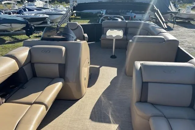 Slide: The Image of 2020 Harris Cruiser 210 pontoon boat with spacious seating and modern design. - 9