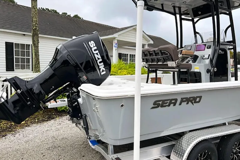 Slide: The Image of 2026 Sea Pro 230 Bay boat with Suzuki outboard motor on trailer. - 15