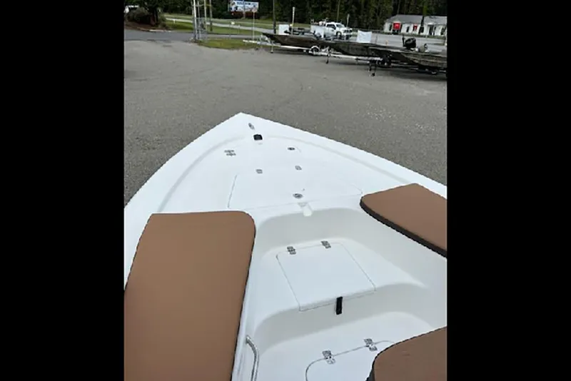 Slide: The Image of 2026 Sea Pro 230 Bay boat with white deck and brown seating. - 5