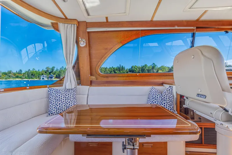 Slide: The Image of Luxurious interior of 2009 Hinckley Talaria 44 MY yacht with scenic water view. - 34