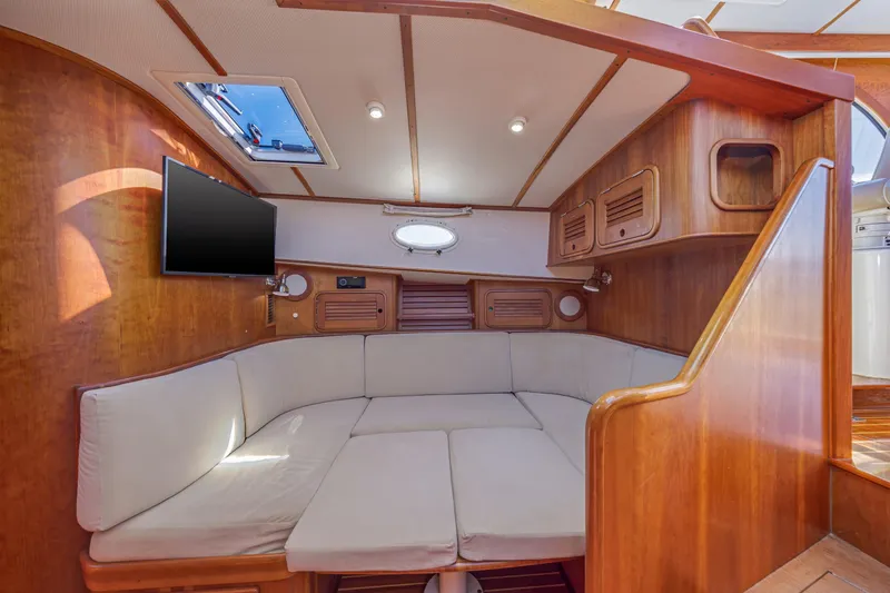 Slide: The Image of Luxurious interior of 2009 Hinckley Talaria 44 MY yacht with cozy seating and modern amenities. - 53