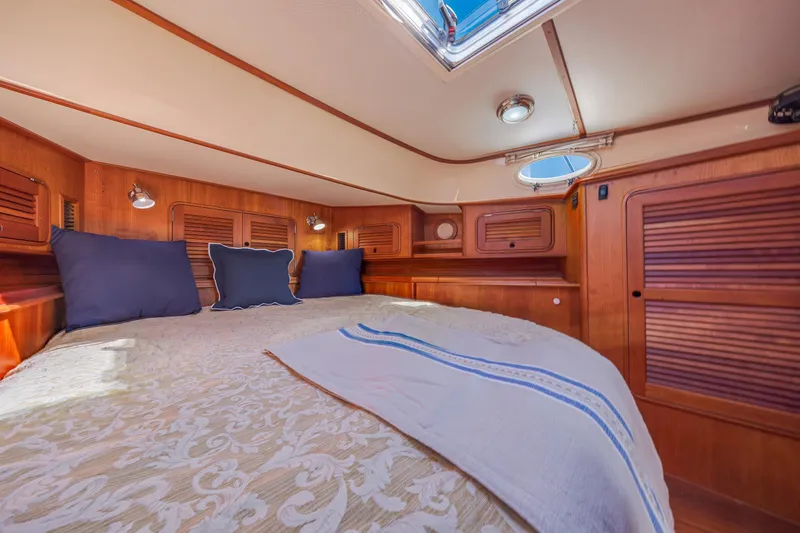 Slide: The Image of Luxurious cabin interior of 2009 Hinckley Talaria 44 MY yacht with elegant wood finish. - 58