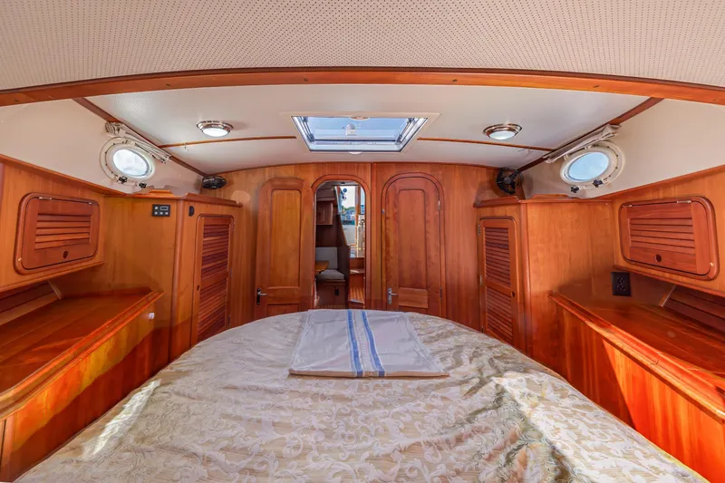 Slide: The Image of Luxurious 2009 Hinckley Talaria 44 MY yacht cabin with elegant wood interior. - 62