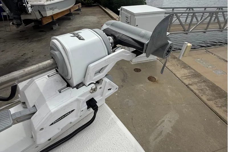 Slide: The Image of 2023 Tides 26 boat with Power-Pole anchor system at dockside. - 21
