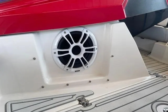 Slide: The Image of Speaker on 2016 Scarab 165 G boat, featuring red and white design. - 5