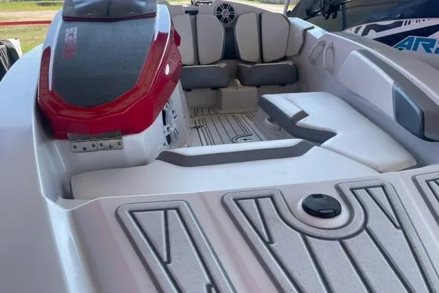 Slide: The Image of 2016 Scarab 165 G boat interior with seating and red engine cover. - 7