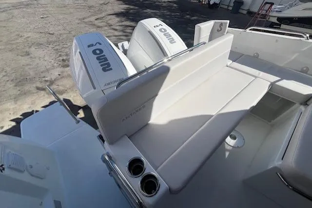 Slide: The Image of 2026 Beneteau Antares 9 V2 boat with dual outboard engines and spacious seating area. - 24