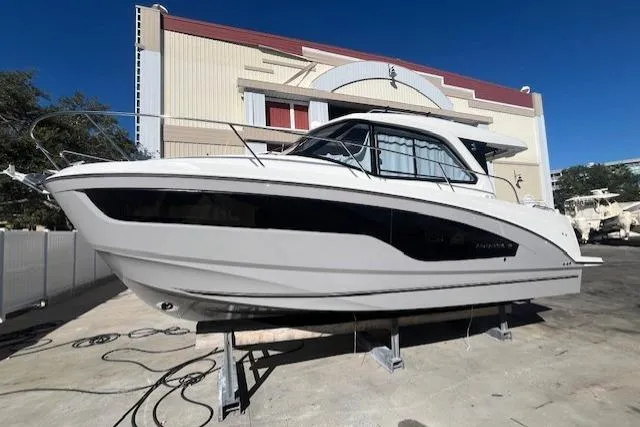 Slide: The Image of 2026 Beneteau Antares 9 V2 boat displayed outdoors on a sunny day. - 5