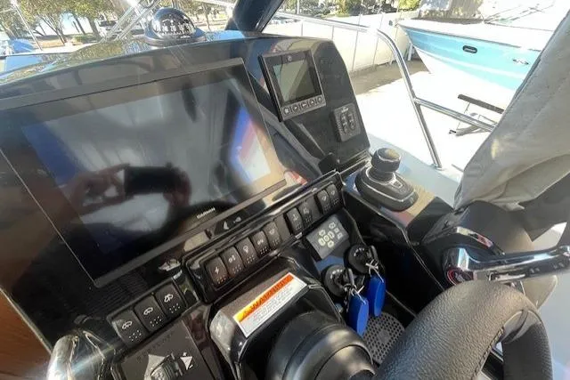 Slide: The Image of Cockpit of 2026 Beneteau Antares 9 V2 with advanced navigation controls and display. - 6