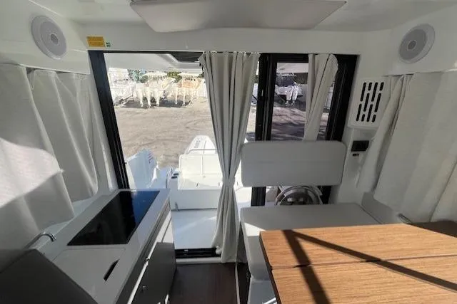 Slide: The Image of Interior view of 2026 Beneteau Antares 9 V2 boat, featuring modern design and seating area. - 8