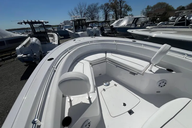 Slide: The Image of 2026 Sportsman Heritage 231 Center Console boat with spacious seating and sleek design. - 21