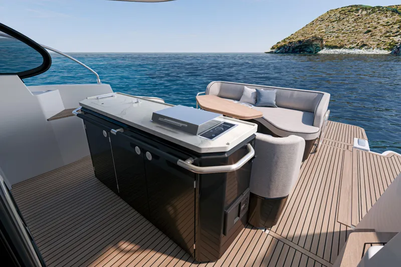 Slide: The Image of Luxurious deck of 2026 Beneteau Gran Turismo 40 yacht with elegant seating and ocean view. - 17