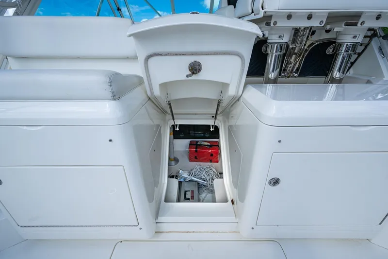 Slide: The Image of 2014 SeaVee 430 boat storage compartment with equipment and seating. - 36