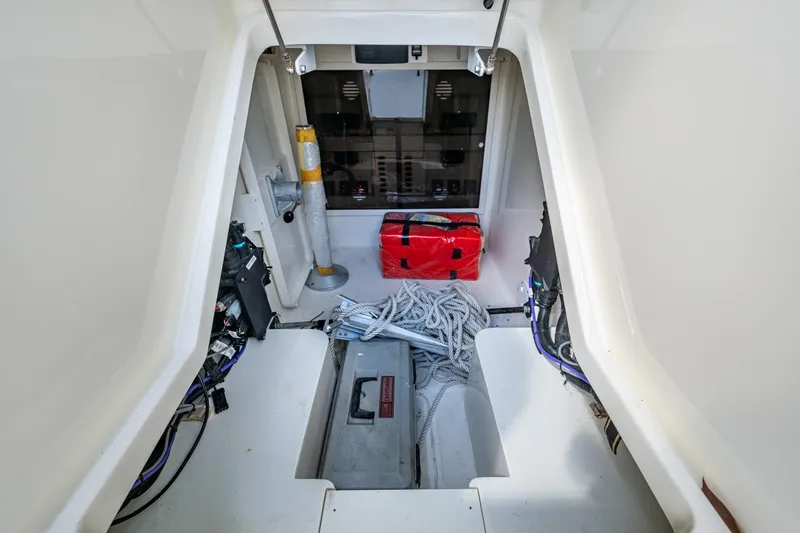Slide: The Image of 2014 SeaVee 430 boat interior with storage, ropes, and equipment. - 37