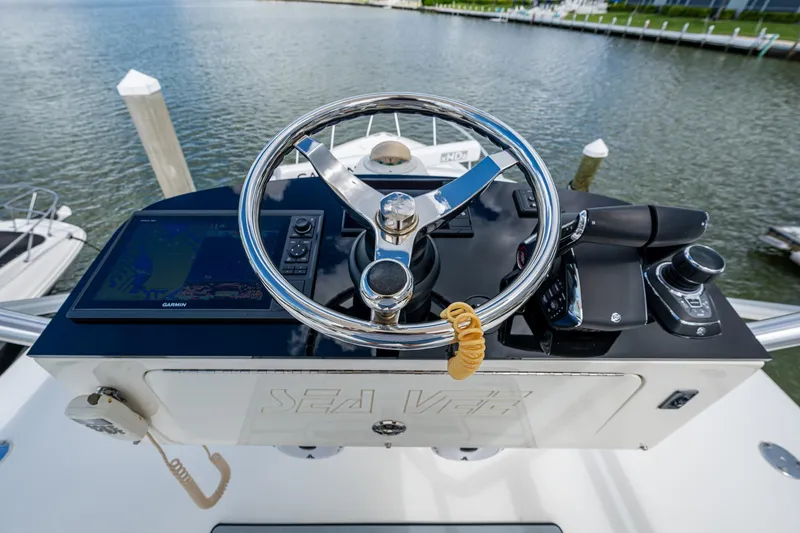 Slide: The Image of Steering console of 2014 SeaVee 430 boat with Garmin navigation system. - 47