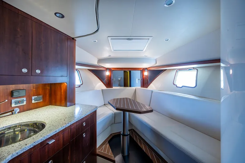 Slide: The Image of Luxurious interior of 2014 SeaVee 430 yacht with modern kitchen and seating area. - 55