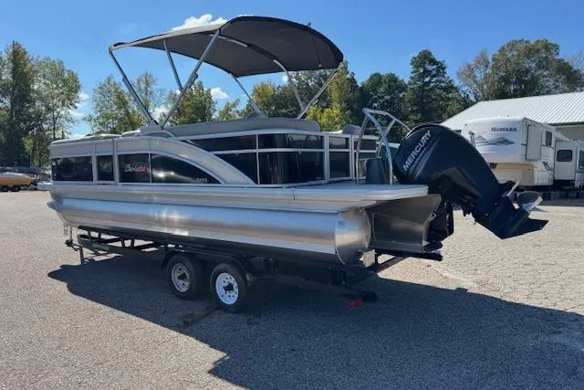 Slide: The Image of 2019 Barletta E22Q SS pontoon boat with canopy and Mercury outboard motor. - 2