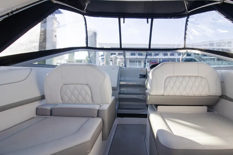 Slide: The Image of Interior of 2020 Regal 26 XO boat with luxurious seating and modern design. - 10