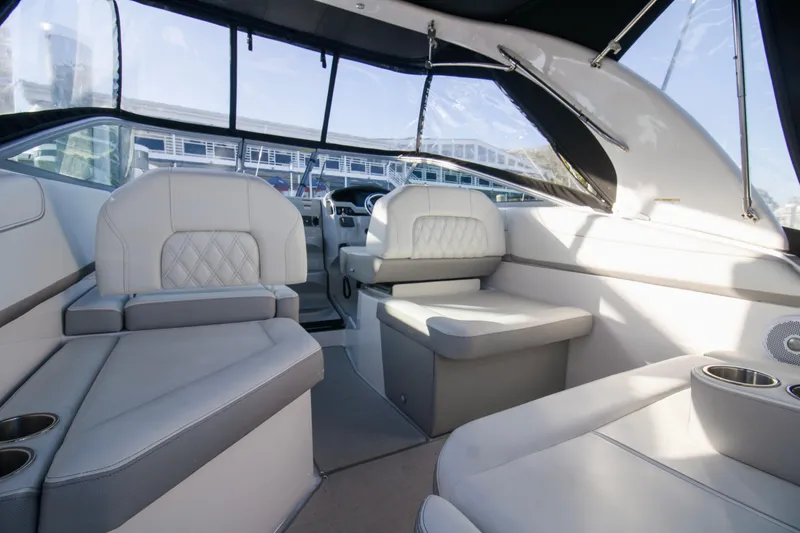 Slide: The Image of 2020 Regal 26 XO boat interior with luxurious seating and modern design. - 12