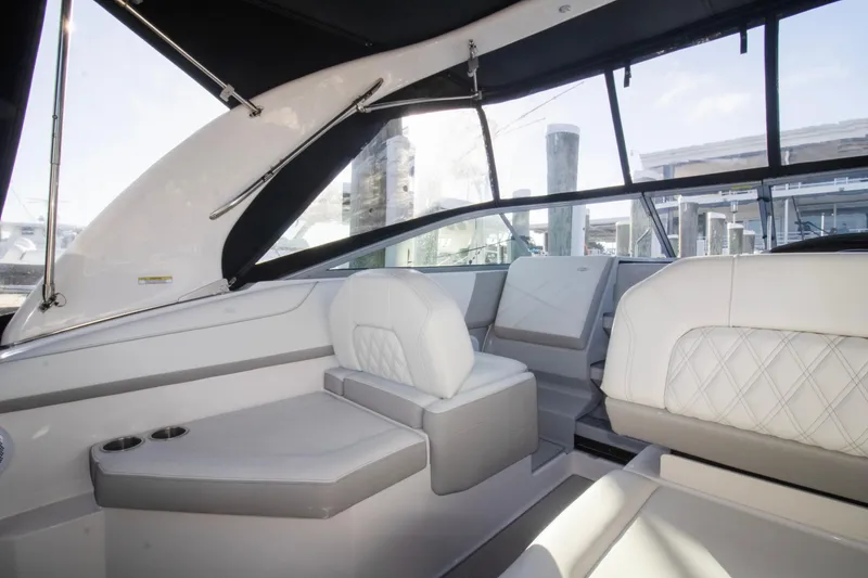 Slide: The Image of 2020 Regal 26 XO boat interior with luxurious seating and modern design. - 9