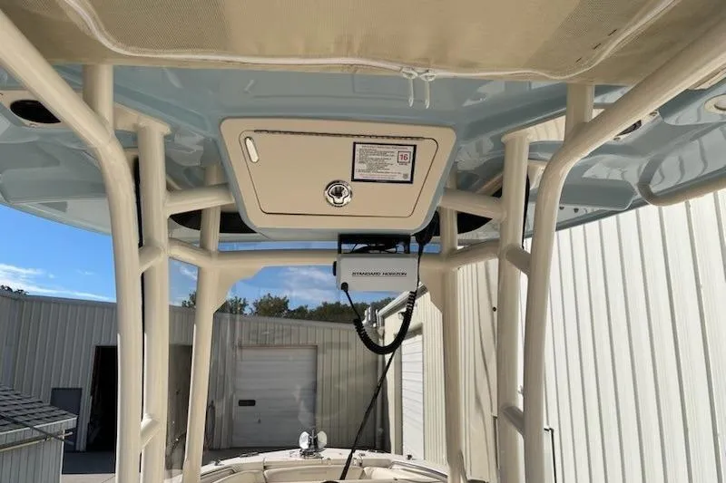 Slide: The Image of 2022 Grady-White Fisherman 236 boat interior, featuring sturdy framework and equipment. - 5