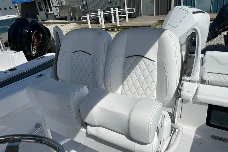 Slide: The Image of 2026 Sportsman Heritage 231 Center Console with luxurious white seating and modern design. - 11