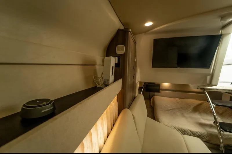 Slide: The Image of Luxurious interior of 2021 Regal 33 OBX boat with cozy seating and modern amenities. - 9