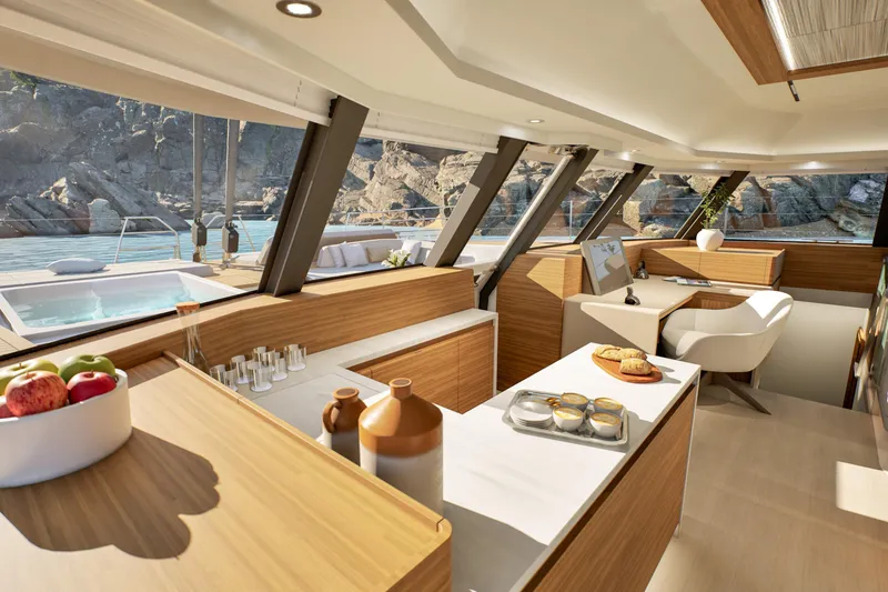 Slide: The Image of Luxurious interior of 2027 Fountaine Pajot 70 S yacht with modern kitchen and scenic views. - 29