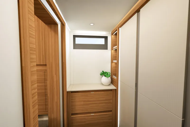 Slide: The Image of Modern interior of 2027 Fountaine Pajot 70 S yacht with wood accents and potted plant. - 42