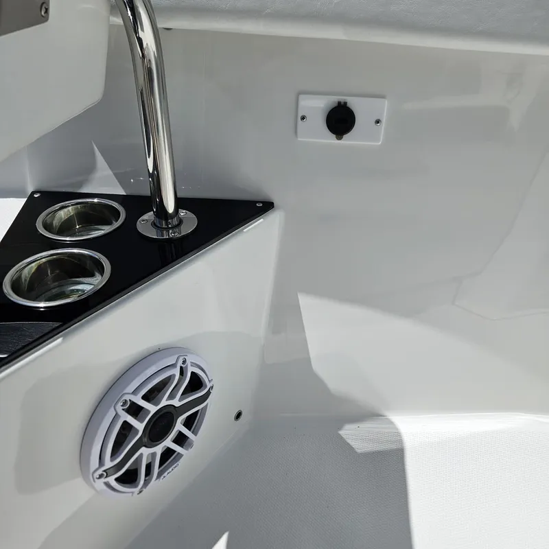 Slide: The Image of Interior of 2019 Blackfin 222 CC boat with cup holders and speaker. - 10