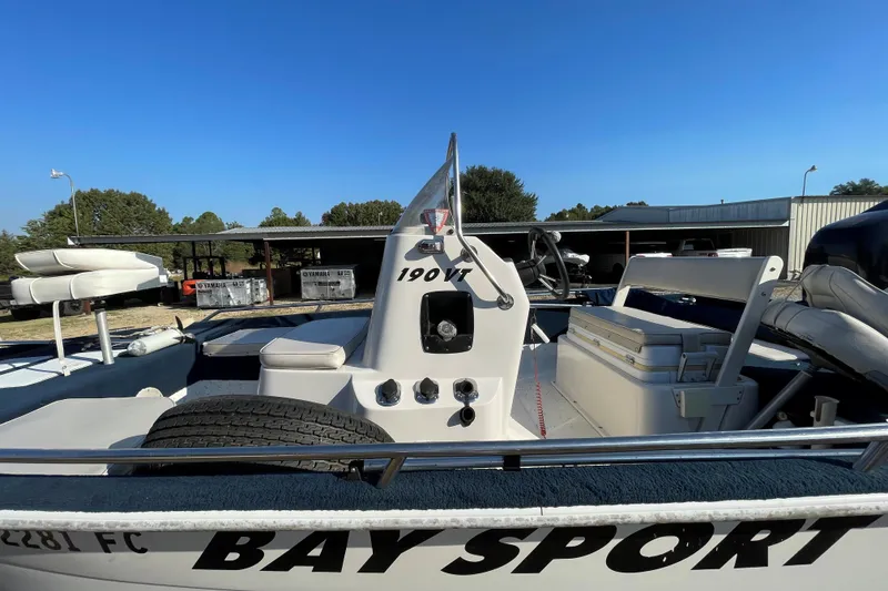 Slide: The Image of 1997 Ebbtide 190 SV boat, Bay Sport model, parked outdoors with clear blue sky. - 4